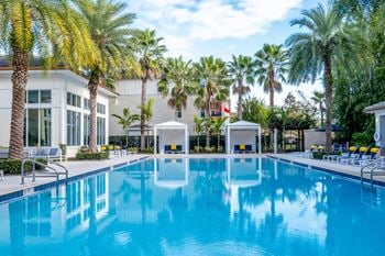 Resort-style, heated swimming pool with cabanas